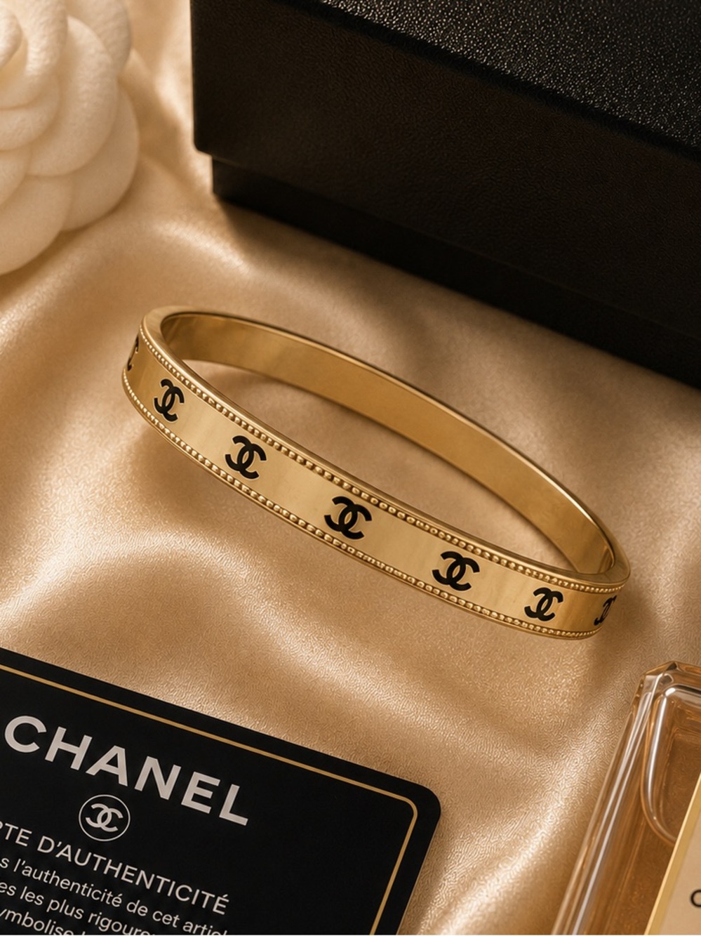 Gold Bracelet with Black CC Motif